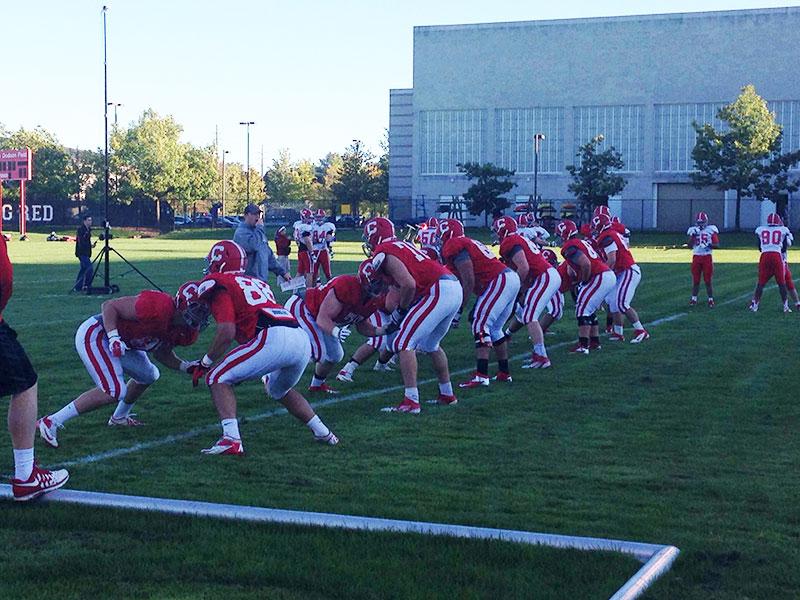 Cornell football players run a drill during practice on Sept. 25 at Hoy Field. The team plays rival Colgate this Saturday at home. 