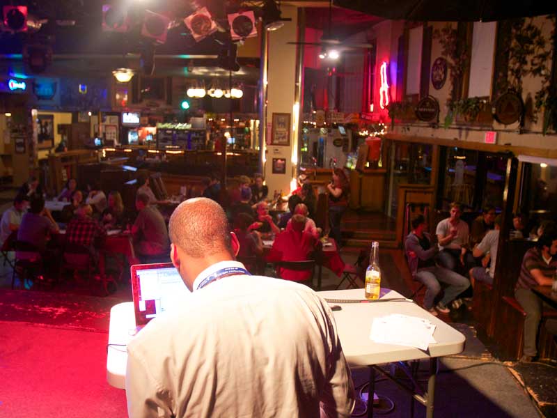 Kenneth McLaurin, Quiz Master at The Haunt, tallies up the scores in between rounds.