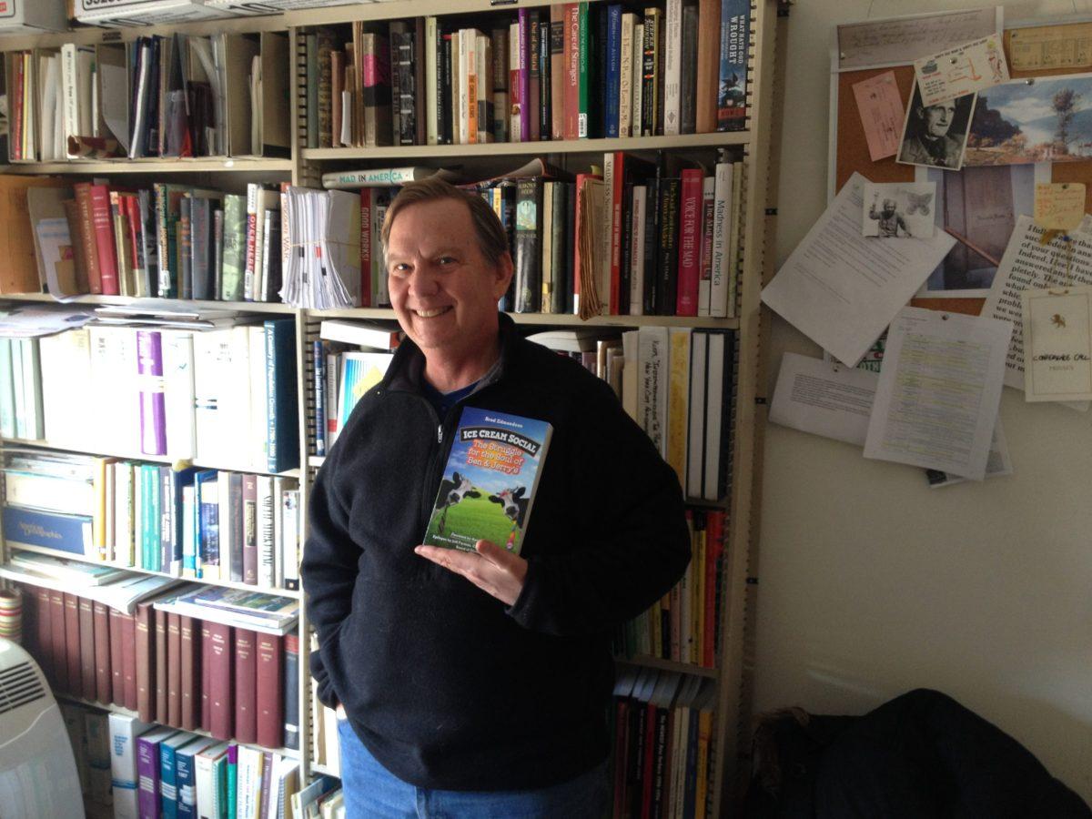 Brad Edmondson, author of “Ice Cream Social: The Struggle for the Soul of Ben & Jerry’s,” stands at his office on East Court Street in Ithaca. The book, which was released in December, tells the stories of the Ben & Jerry’s struggle to be faithful to its social mission after it was sold to Unilever.  Timothy Bidon/Ithaca Week