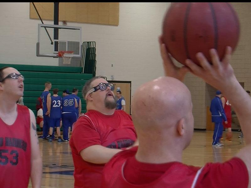 Ithaca resident Jeff Krizek, 44, aims at the hoop during the NY Special Olympics Basketball Super Regionals on April 5 at TC3.  