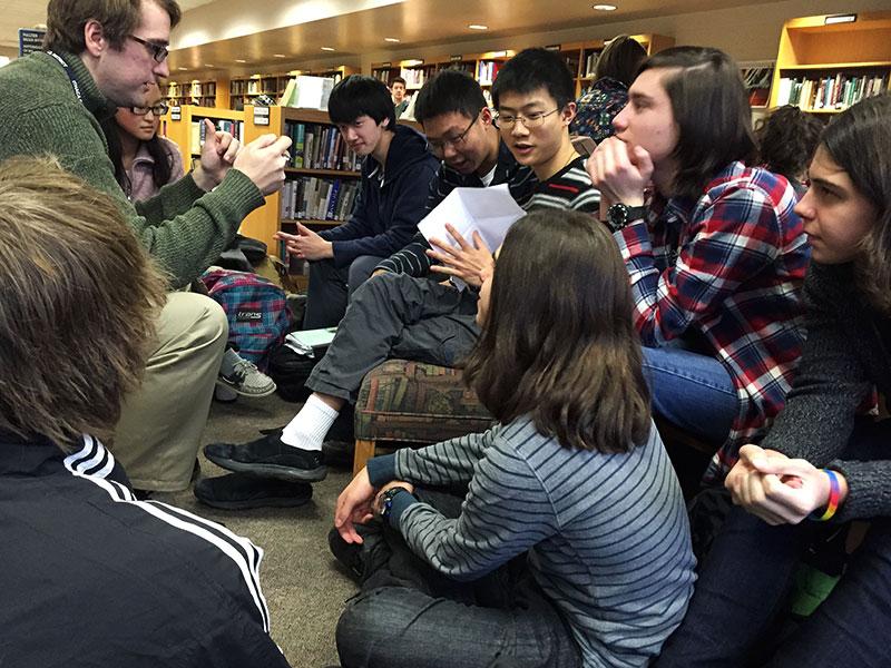 Members of the Ithaca High School Brain Team practice answering Quizbowl questions in preparation for the national competition.