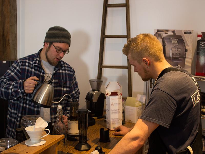 Jesse Harriott pours a cup of coffee in Copper Horse's tasting room.