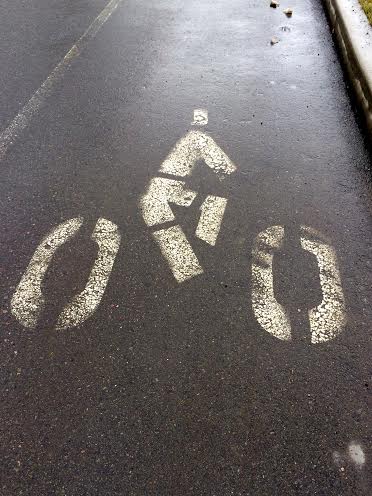 Bicycle sign on road