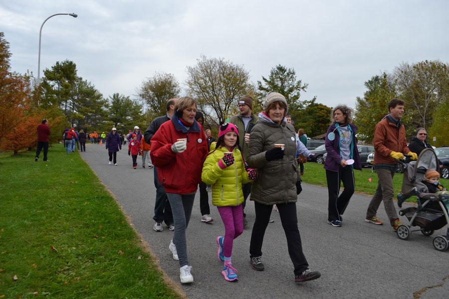 Participants stay warm with hot drinks during the Cancer Resource Center's Walkathon/5K run.