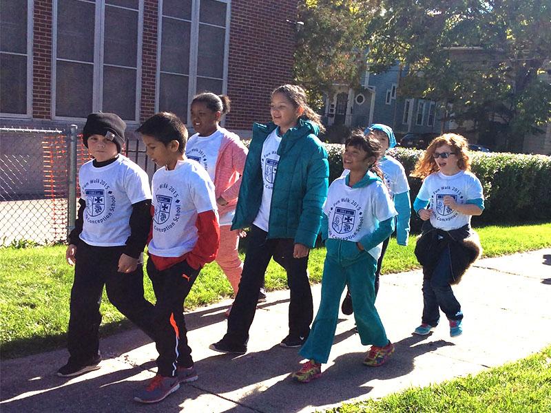 Students spend the last two hours of their school day outside, taking laps to raise money for their school.