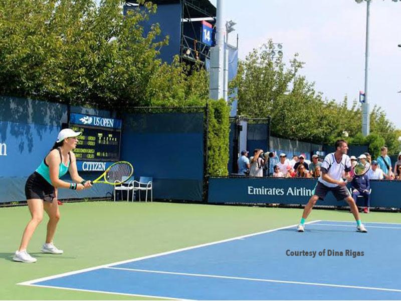 Anda Perianu and Andrei Deascu in mixed doubles action at the 2015 US Open.
