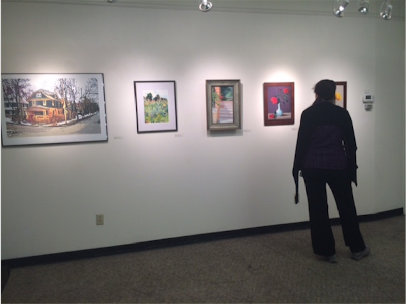 A visitor admires the Community School of Music and Arts’ Gallery opening on Nov. 6.