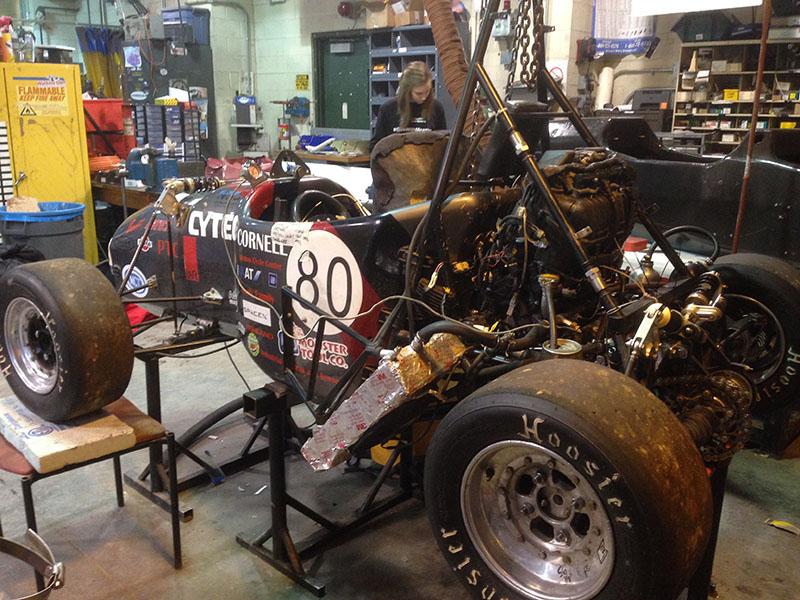 Cornell junior Monika Wiktorzak works on this year’s race car frame, set next to last year’s model, pictured in foreground.
Photo by Kayla Dwyer.