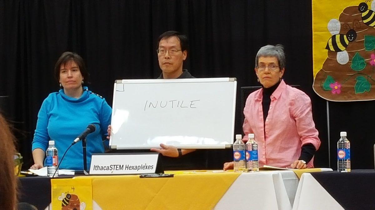 From left: Karen Trible, Mark Chao and Suzanne Nussbaum of the IthacaSTEM Hexaplexes present the correct spelling of the word “littoral” to win the 18th annual Adult Spelling Bee.