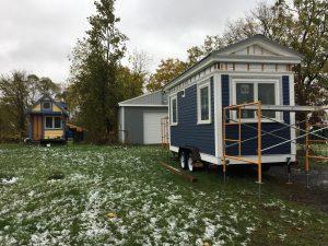 Photo by Sydney O’Shaughnessy Hammerstone School’s first tiny house (left) and the school’s new tiny house, still under construction (right). Tiny houses are one of the projects Klemperer Johnson teaches to her Hammerstone students.