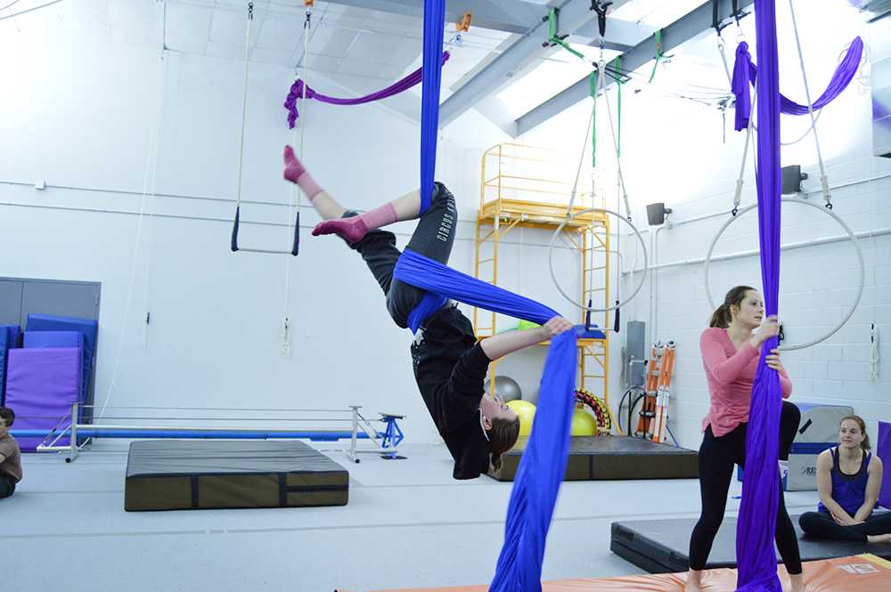 Alex Sosebee practices on aerial silks at Circus Culture.