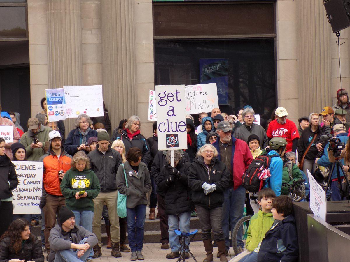 Participants attend Ithaca’s March for Science on April 22 on The Ithaca Commons. (Celisa Calacal)