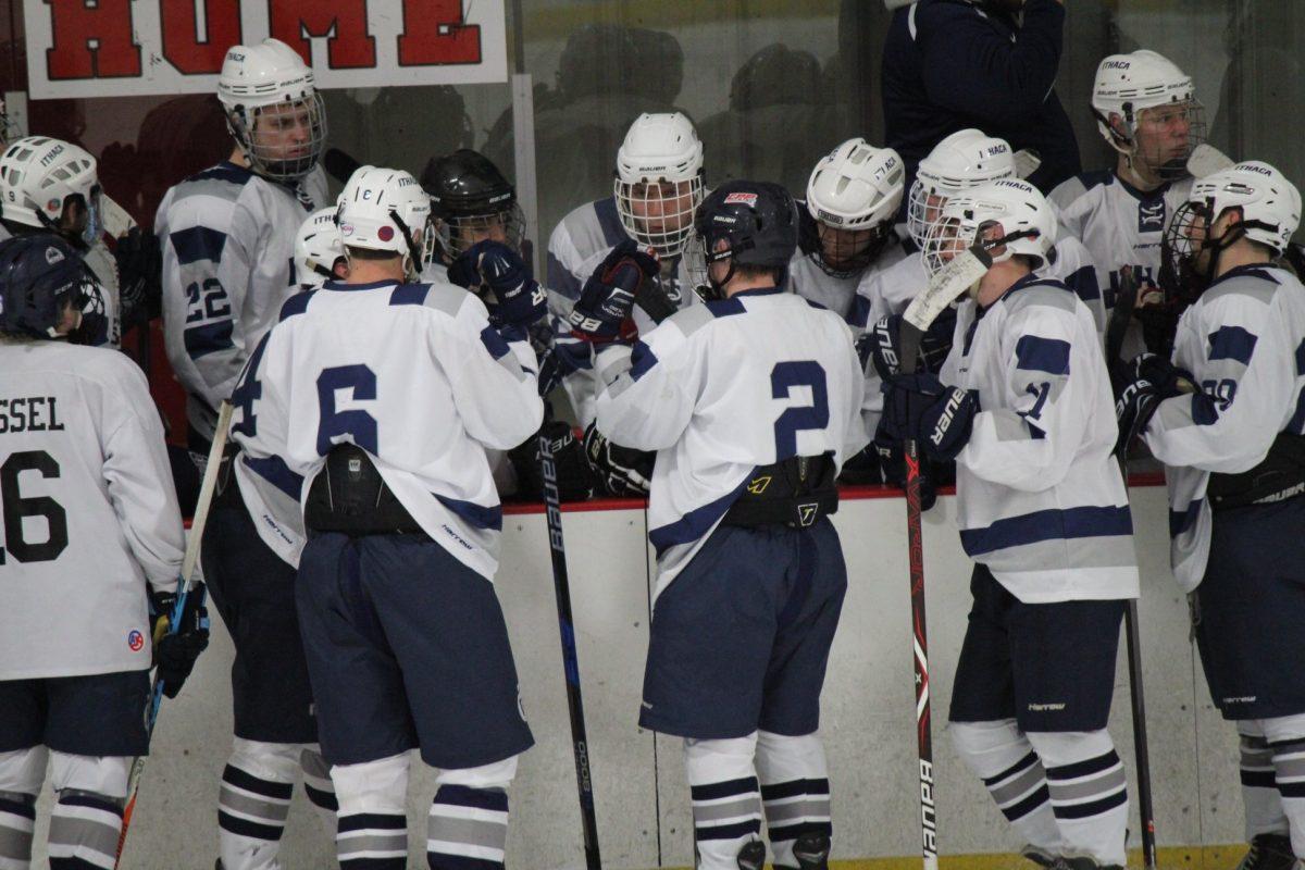 Ithaca College Club hockey plans out their next play on a timeout