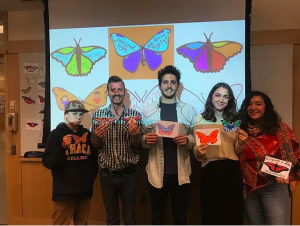 Ithaca Murals and IC FUTURES executive board members posing with their butterflies. Photo courtesy of IC FUTURES.
