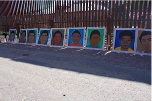 Paintings of people who disappeared or were killed by Border Patrol Agents. More than 100 people died at the border. One victim was teenager José Antonio Elena Rodriguez, shot at least 10 times by a border patrol agent in 2012. The agent was found not guilty. Photo courtesy of Diana Castillo.