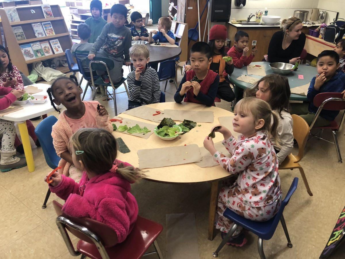 Kindergarteners at Belle Sherman Elementary School try local produce as they create vegetable rolls during the Fresh Snack Programs Rainbow Nutrition class. (Photo courtesy of Vanessa Wood)