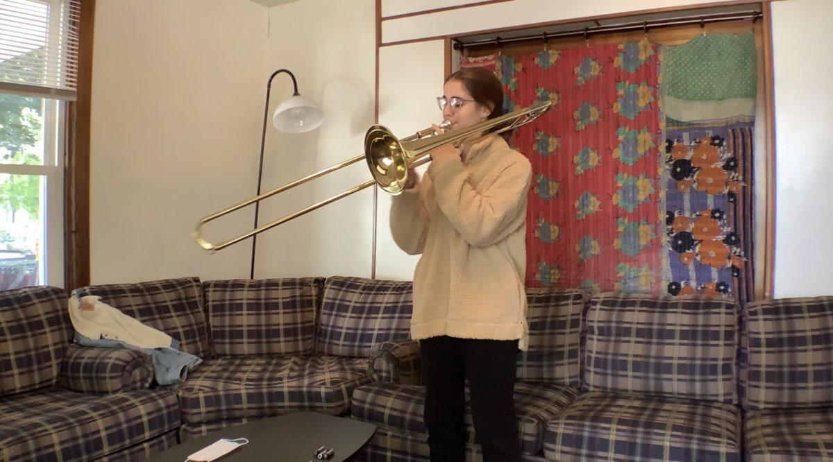 Senior Karly Masters is learning two new instruments this semester via Zoom, trombone and horn. (Photo by Emily Lussier/Ithaca Week)