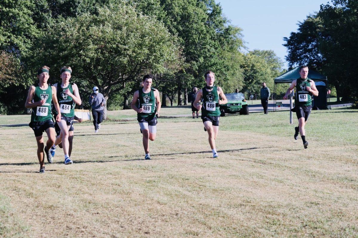 The Tompkins Cortland Community College cross-country team starts a race. The teams run individually instead of head-to-head at meets this season.