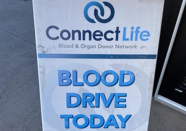 A sign that reads ConnectLife Blood Drive Today