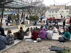 Ithaca community gathers in the Commons to listen to local activists - Photo by Ryan Bieber