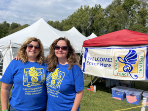 Maura Fetsko (left) and Kristy Colbert (right) enjoying the sunshine on the last day of the Ithaca Peace Festival | Source: Lucy Calderon
