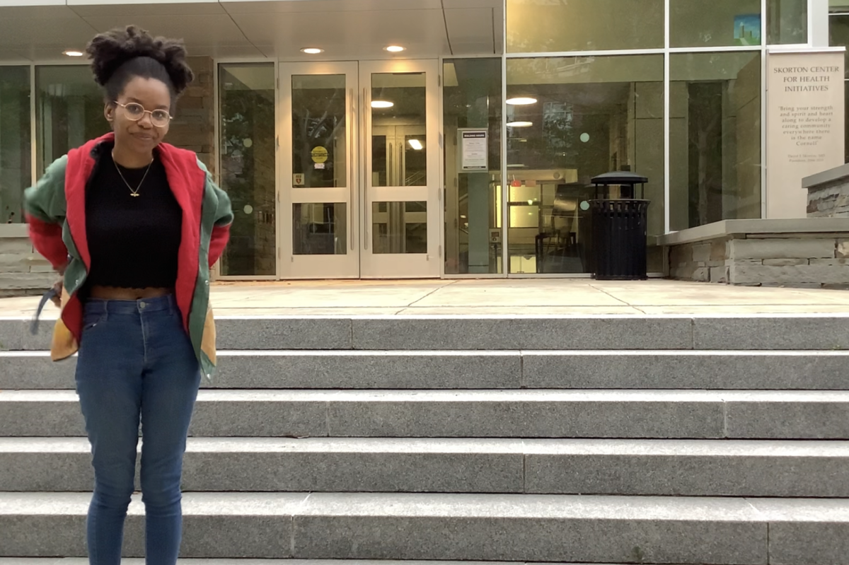 Senior Bianca Beckwith standing outside Cornell’s Skorton Center for Health Initiatives. Skorton staff help guide campus mental health initiatives with educational resources and programming. Source: Nijha Young for Ithaca Week.