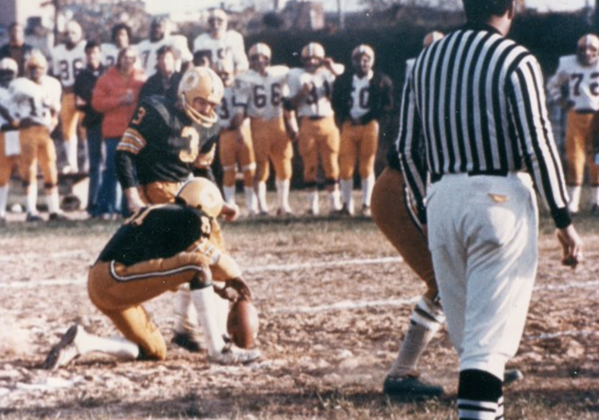 H. Jay Spiegel kicking for the DC Bears in a semi-pro league game