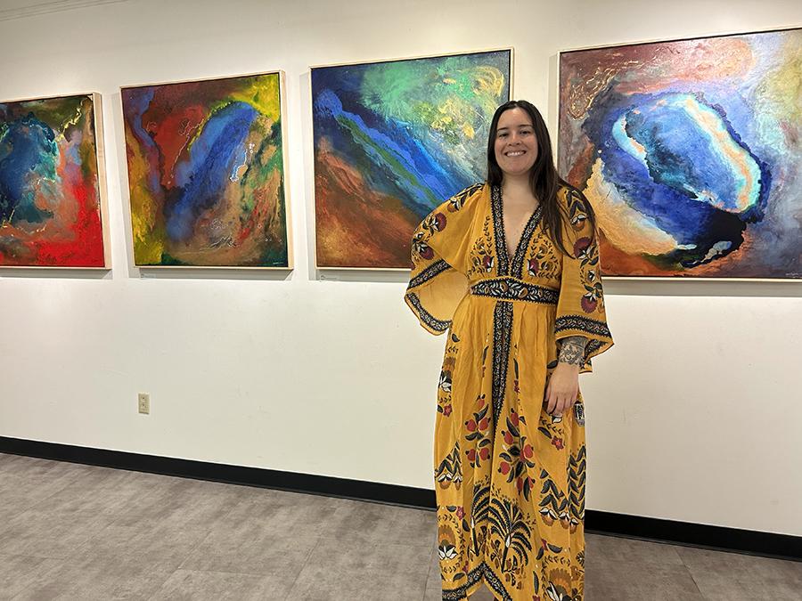 Yen Ospina, a Colombian American artist who currently lives in Ithaca, curated and was a featured artist in the Latinx and Hispanic art exhibition that happened on Oct. 6 at the Community School of Music and Arts. (Kalysta Donaghy-Robinson/Ithaca Week)