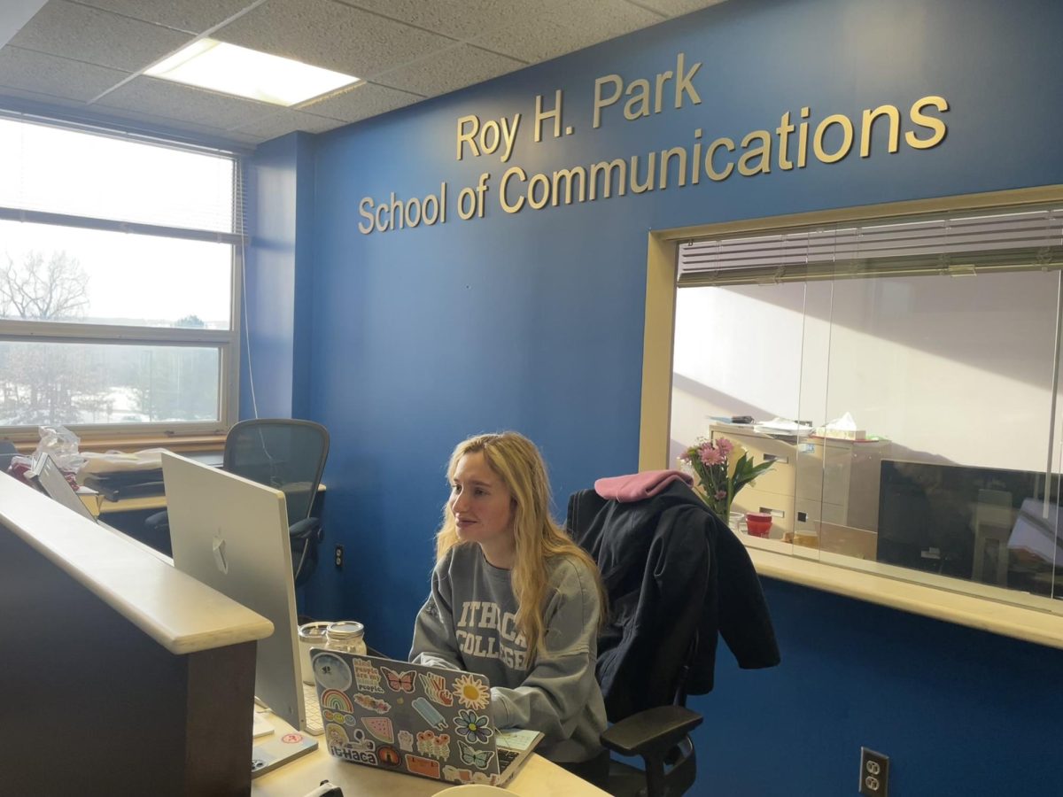 Junior Sam Smith works as an office assistant at the Dean's Office in Ithaca College's Park School of Communications on Feb. 5, 2025. Smith started this position a month ago and helps manage visits to the office and schedules meetings and appointments for staff members.