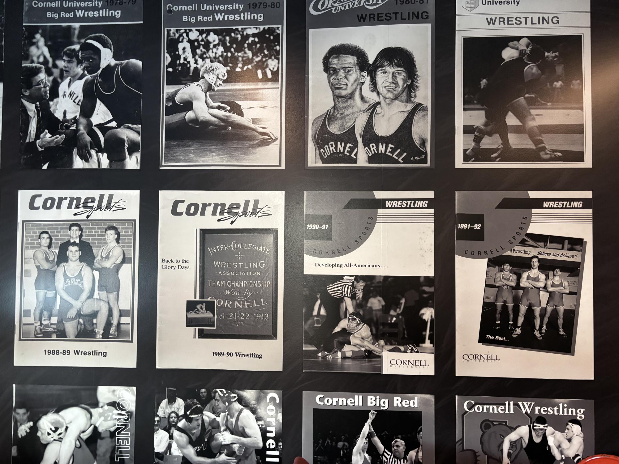 Vintage magazine covers hung on the wall of Cornell's wrestling lounge.     