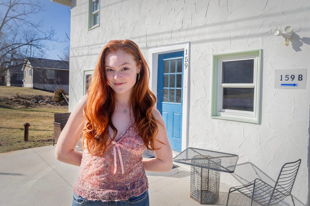 Senior acting major Ruth McCoy Miles outside of her off-campus house.