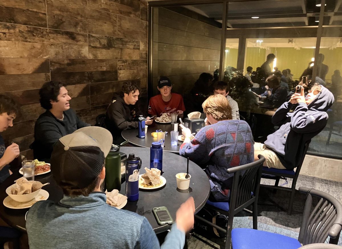 Students eating dinner in Terrace Dining Hall at Ithaca College.