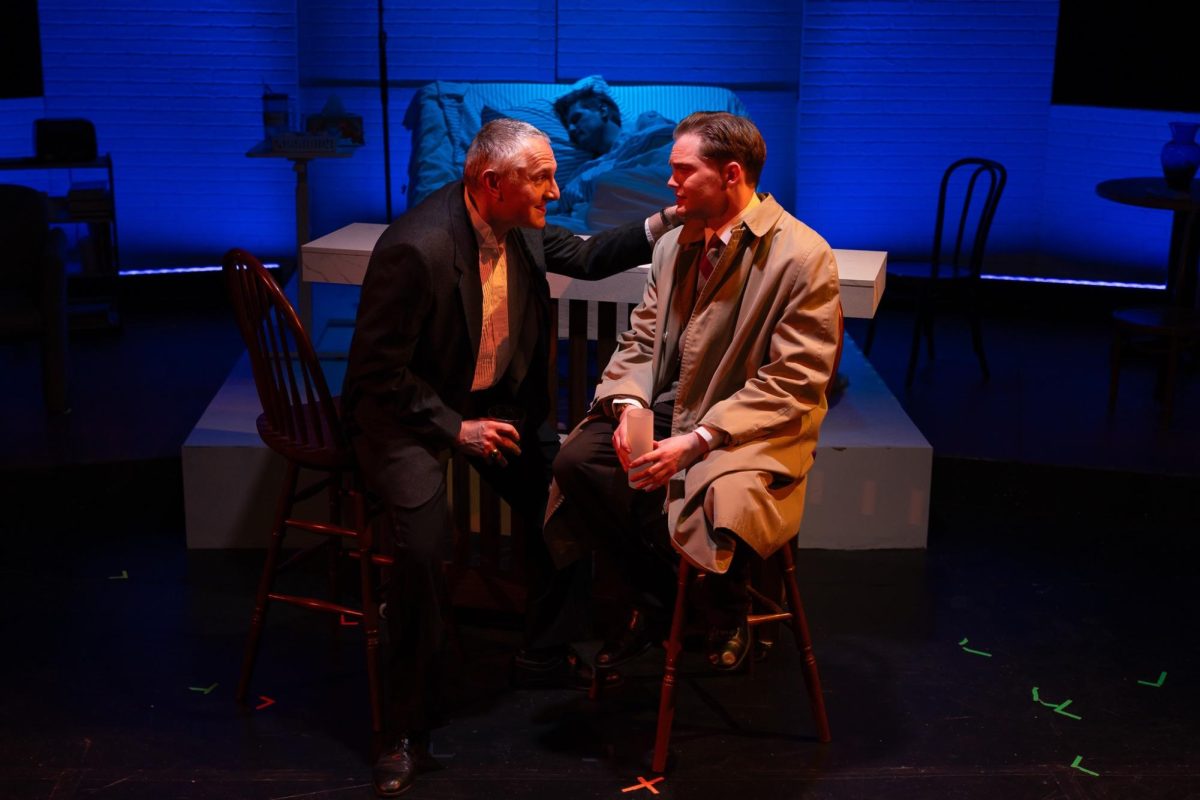 From left, actors Roy Cohn and Joe Pitt have a heart-to-heart on stage during Angels in America
(Gary Hodges / Theatre Incognita)